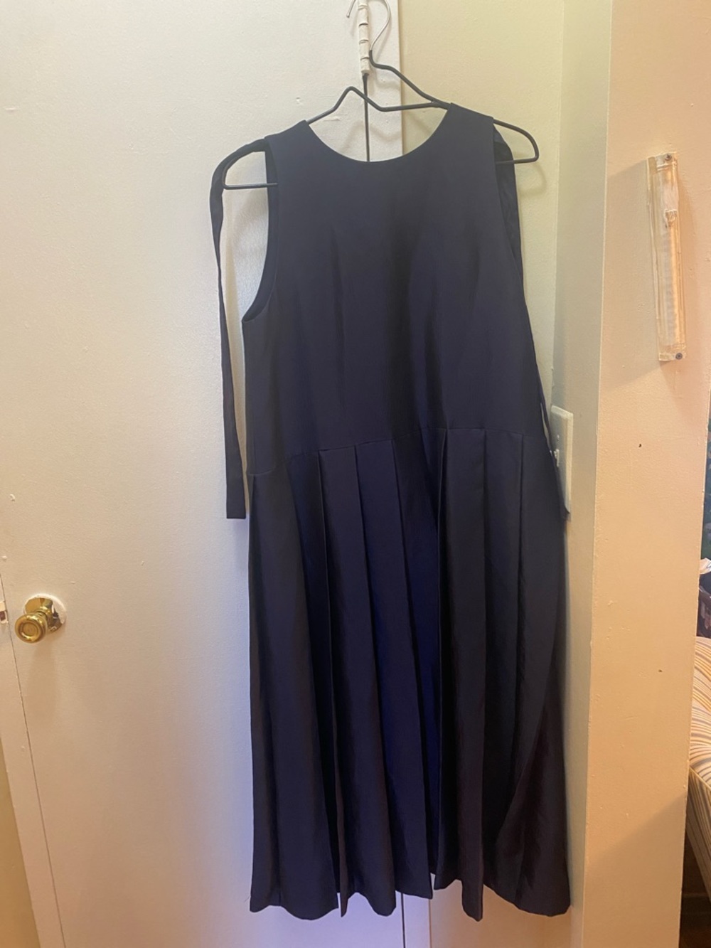Sleeveless Navy Midi Dress with Pleated Skirt